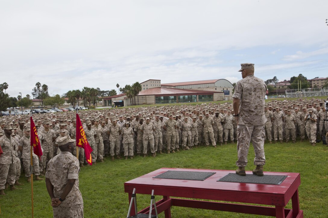 Commandant of the Marine Corps, Gen. Robert B. Neller, speaks to Marines at the Mainside Parade Deck, Camp Pendleton, Calif., Oct. 5, 2015. Neller outlined the Corps current priorities, expectations, listened and answered Marines' questions. (U.S. Marine Corps photo by Sgt. Gabriela Garcia/Released)