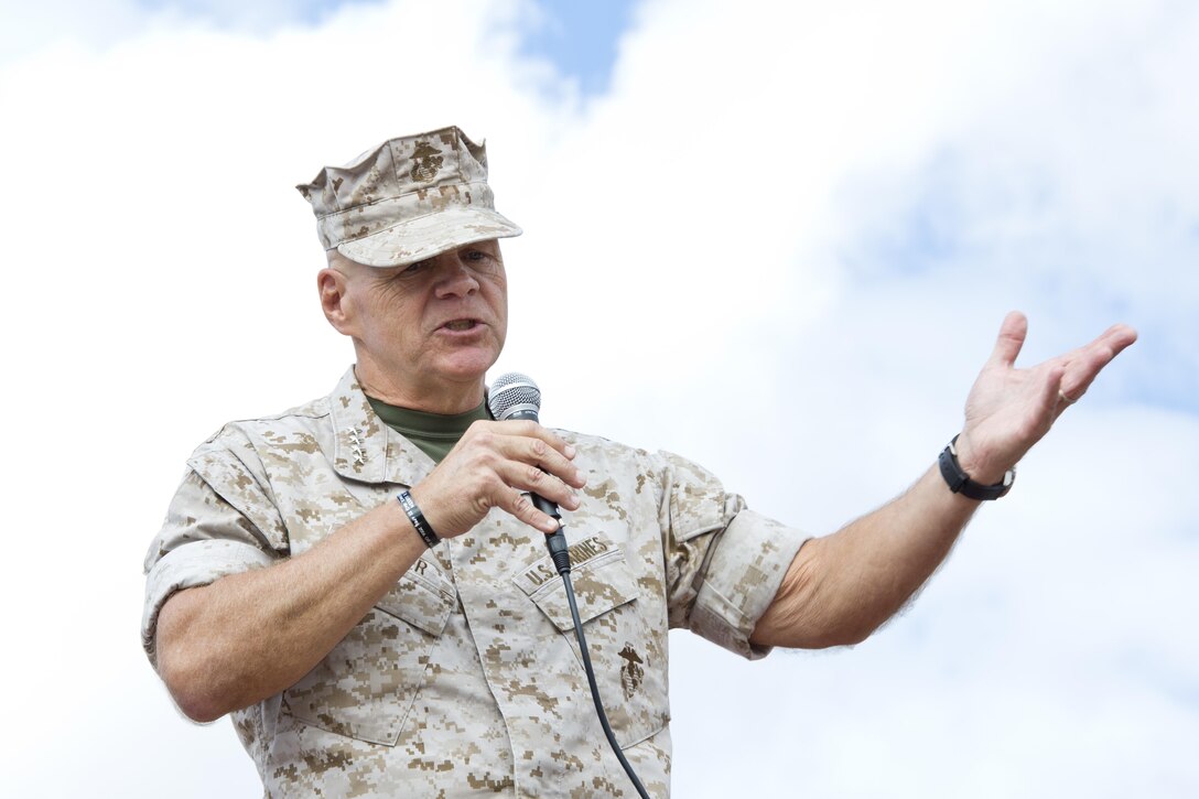 Commandant of the Marine Corps, Gen. Robert B. Neller, speaks to Marines at the Las Pulgas Parade Deck, Camp Pendleton, Calif., Oct. 5, 2015. Neller outlined the Corps current priorities, expectations, listened and answered Marines' questions. (U.S. Marine Corps photo by Sgt. Gabriela Garcia/Released)