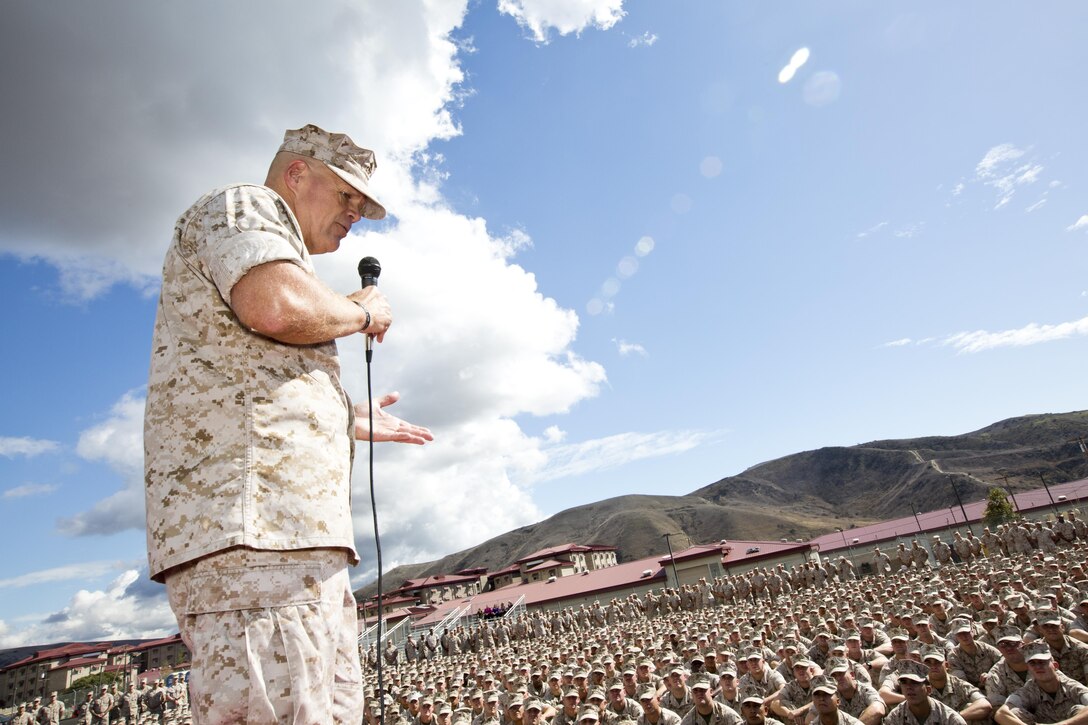 Commandant of the Marine Corps, Gen. Robert B. Neller, speaks to Marines, Sailors and civilians at the San Mateo Parade Deck, Camp Pendleton, Calif., Oct. 5, 2015. Neller outlined the Corps current priorities, expectations, listened and answered Marines' questions. (U.S. Marine Corps photo by Sgt. Gabriela Garcia/Released)