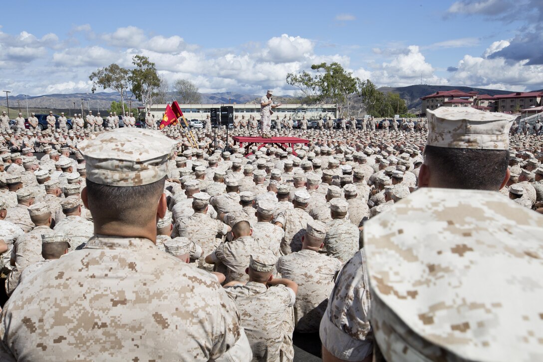 U.S. Marines listen to Commandant of the Marine Corps, Gen. Robert B. Neller, at the San Mateo Parade Deck, Camp Pendleton, Calif., Oct. 5, 2015. Neller outlined the Corps current priorities, expectations, listened and answered Marines' questions. (U.S. Marine Corps photo by Sgt. Gabriela Garcia/Released)
