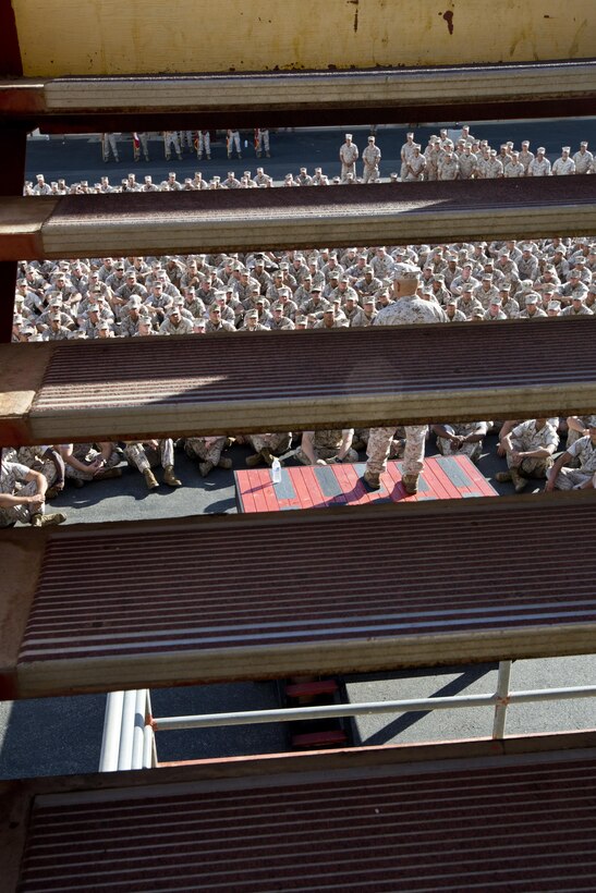 Commandant of the Marine Corps, Gen. Robert B. Neller, speaks to Marines, Sailors and civilians at the Las Flores Parade Deck, Camp Pendleton, Calif., Oct. 5, 2015. Neller outlined the Corps current priorities, expectations, listened and answered Marines' questions. (U.S. Marine Corps photo by Sgt. Gabriela Garcia/Released)