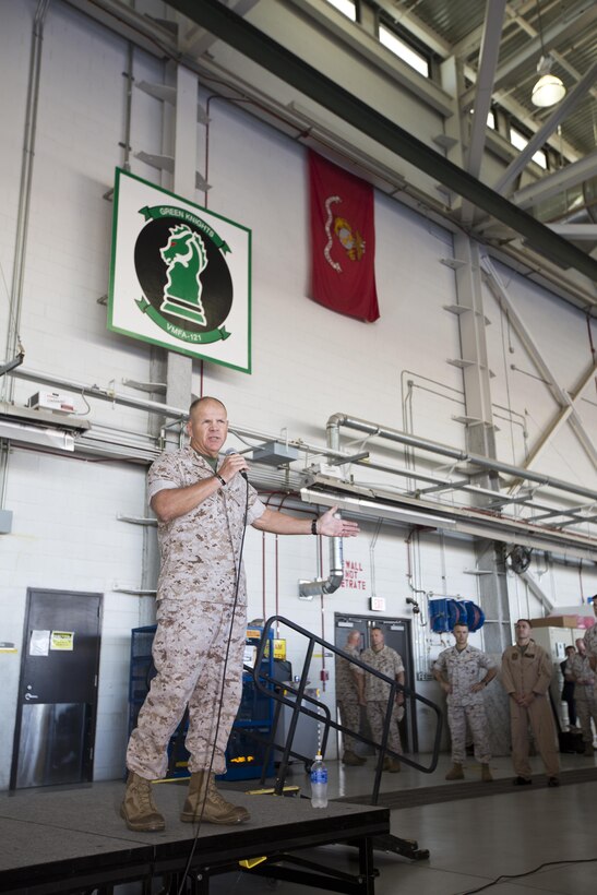 Commandant of the Marine Corps, Gen. Robert B. Neller, speaks to Marines, Sailors and civilians at Marine Corps Air Station Yuma, Ariz., Oct. 7, 2015. Neller outlined the Corps current priorities, expectations, listened and answered Marines' questions. (U.S. Marine Corps photo by Sgt. Gabriela Garcia/Released)