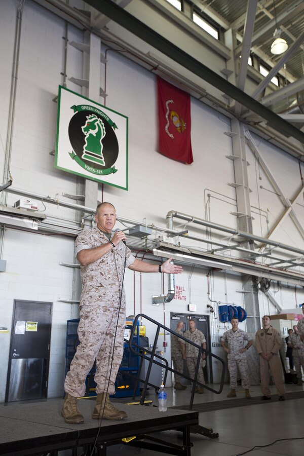 Commandant of the Marine Corps, Gen. Robert B. Neller, speaks to Marines, Sailors and civilians at Marine Corps Air Station Yuma, Ariz., Oct. 7, 2015. Neller outlined the Corps current priorities, expectations, listened and answered Marines' questions. (U.S. Marine Corps photo by Sgt. Gabriela Garcia/Released)