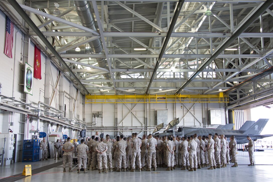 Commandant of the Marine Corps, Gen. Robert B. Neller, speaks to Marines, Sailors and civilians at Marine Corps Air Station Yuma, Ariz., Oct. 7, 2015. Neller outlined the Corps current priorities, expectations, listened and answered Marines' questions. (U.S. Marine Corps photo by Sgt. Gabriela Garcia/Released)