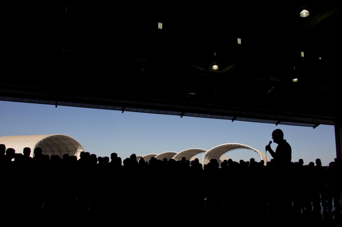Commandant of the Marine Corps, Gen. Robert B. Neller, speaks to Marines, Sailors and civilians at Marine Corps Air Station Yuma, Ariz., Oct. 7, 2015. Neller outlined the Corps current priorities, expectations, listened and answered Marines' questions. (U.S. Marine Corps photo by Sgt. Gabriela Garcia/Released)