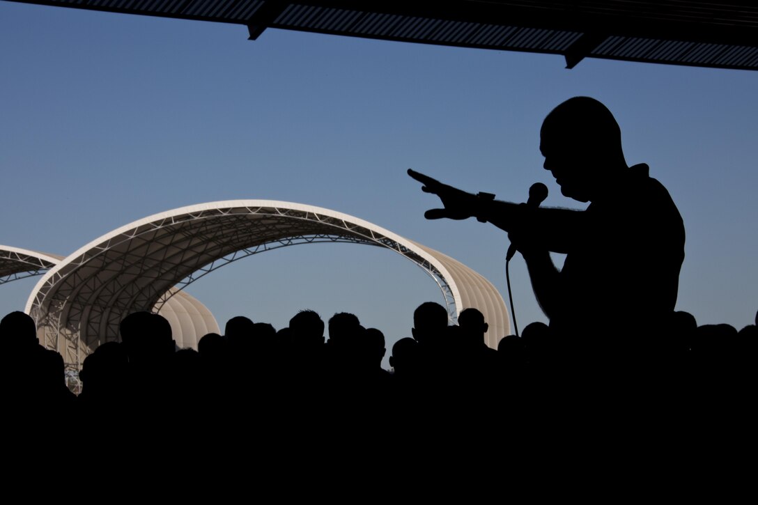 Commandant of the Marine Corps, Gen. Robert B. Neller, speaks to Marines, Sailors and civilians at Marine Corps Air Station Yuma, Ariz., Oct. 7, 2015. Neller outlined the Corps current priorities, expectations, listened and answered Marines' questions. (U.S. Marine Corps photo by Sgt. Gabriela Garcia/Released)