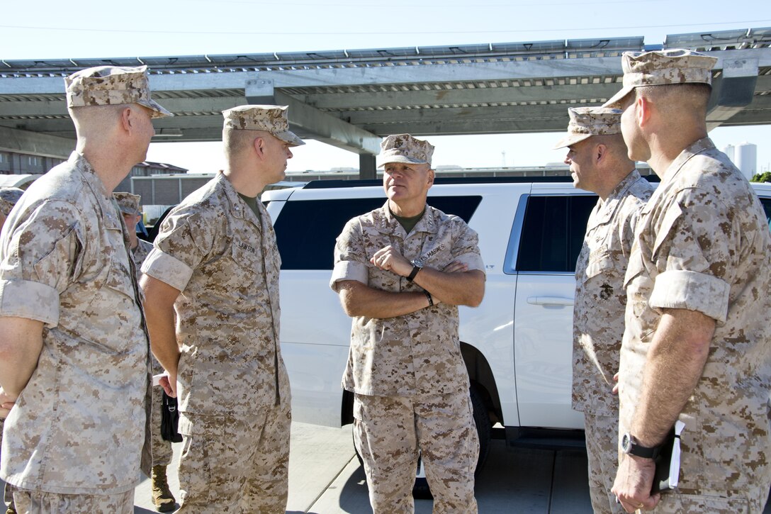 Commandant of the Marine Corps, Gen. Robert B. Neller, talks with Marines at Marine Corps Air Station Yuma, Ariz., Oct. 7, 2015. Neller outlined the Corps current priorities, expectations, listened and answered Marines' questions during his Yuma visit. (U.S. Marine Corps photo by Sgt. Gabriela Garcia/Released)