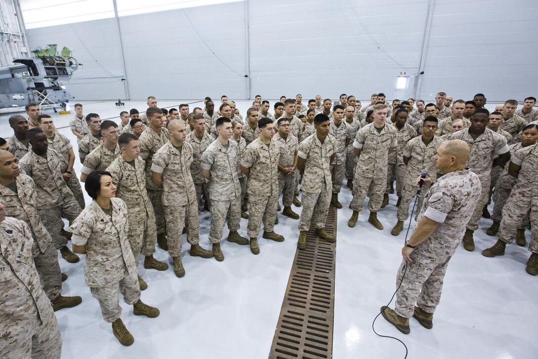 Commandant of the Marine Corps, Gen. Robert B. Neller, speaks to Marines, Sailors and civilians at Marine Corps Air Station Yuma, Ariz., Oct. 7, 2015. Neller outlined the Corps current priorities, expectations, listened and answered Marines' questions. (U.S. Marine Corps photo by Sgt. Gabriela Garcia/Released)