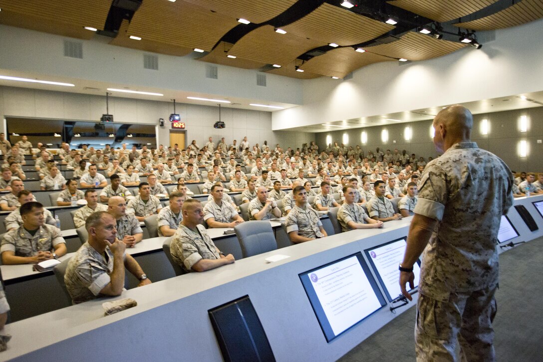 Commandant of the Marine Corps, Gen. Robert B. Neller, speaks to Marines at Marine Corps Air Station Yuma, Ariz., Oct. 7, 2015. Neller outlined the Corps current priorities, expectations, listened and answered Marines' questions. (U.S. Marine Corps photo by Sgt. Gabriela Garcia/Released)