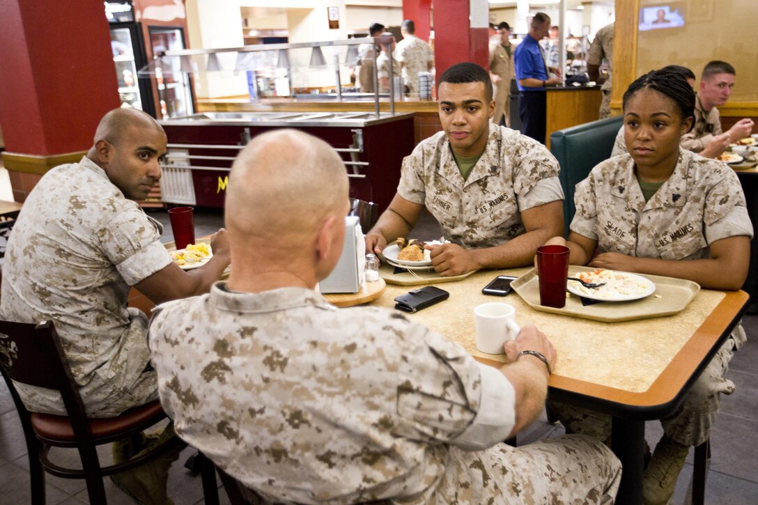 Commandant of the Marine Corps, Gen. Robert B. Neller, speaks to Marines at a dining facility, Marine Corps Air Station Yuma, Ariz., Oct. 7, 2015. Neller outlined the Corps current priorities, expectations, listened and answered Marines' questions during his Yuma visit. (U.S. Marine Corps photo by Sgt. Gabriela Garcia/Released)
