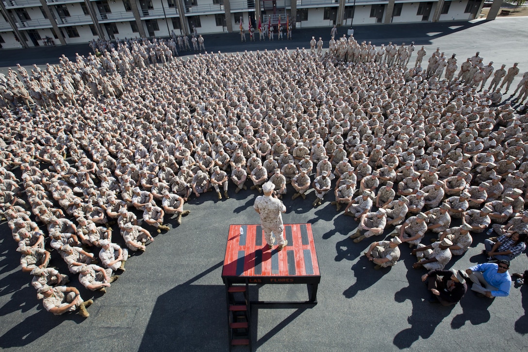 Commandant of the Marine Corps, Gen. Robert B. Neller, speaks to Marines, Sailors and civilians at the Las Flores Parade Deck, Camp Pendleton, Calif., Oct. 5, 2015. Neller outlined the Corps current priorities, expectations, listened and answered Marines' questions. (U.S. Marine Corps photo by Sgt. Gabriela Garcia/Released)