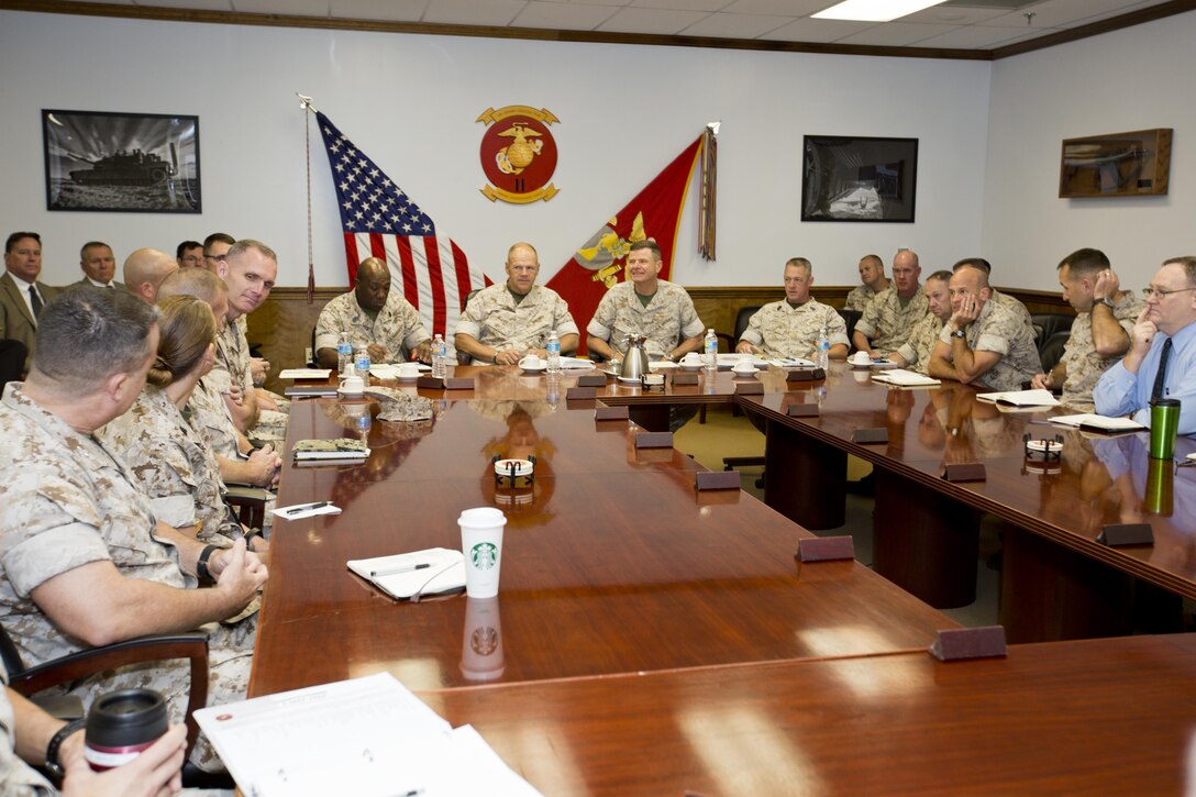 Commandant of the Marine Corps, Gen. Robert B. Neller, center, meets with II Marine Expeditionary Force leaders at Camp Lejeune, N.C., Oct. 8, 2015. Neller discussed the Corps current priorities and visited Marines during his Lejeune visit. (U.S. Marine Corps photo by Sgt. Gabriela Garcia/Released)