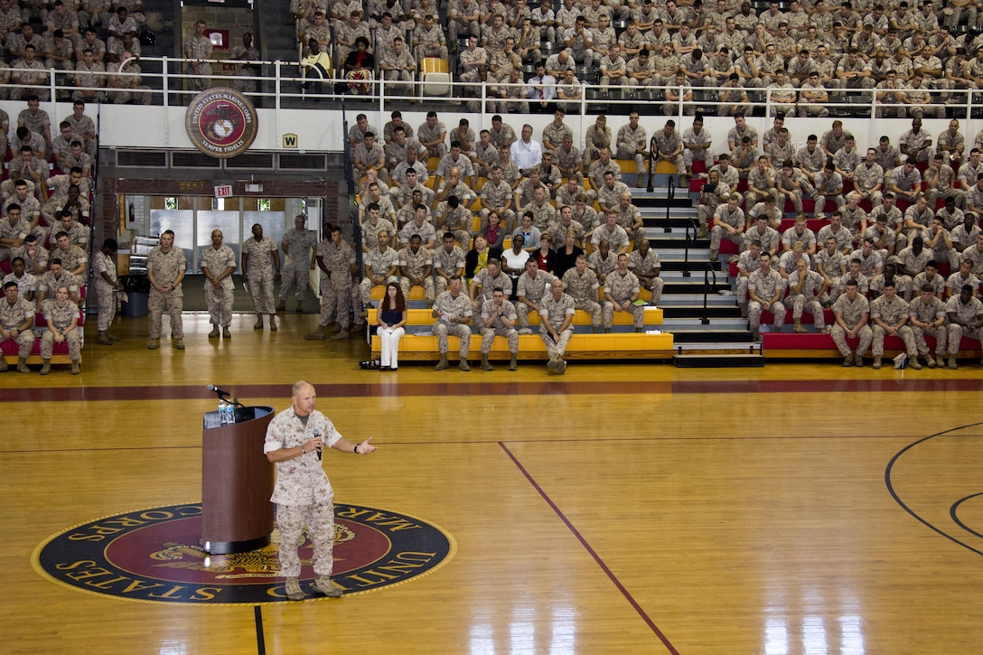 Commandant of the Marine Corps, Gen. Robert B. Neller, speaks to Marines, Sailors and civilians at Goettge Memorial Field House, Camp Lejeune, N.C., Oct. 8, 2015. Neller outlined the Corps current priorities, expectations, listened and answered questions during his Lejeune visit. (U.S. Marine Corps photo by Sgt. Gabriela Garcia/Released)