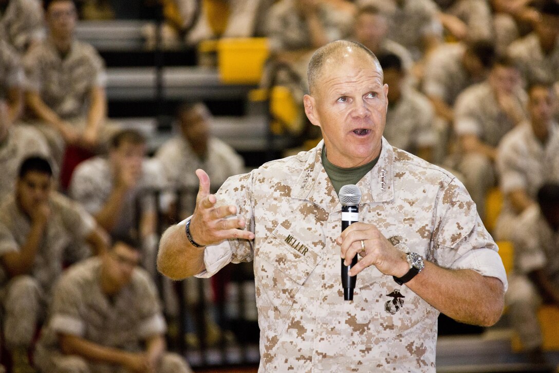 Commandant of the Marine Corps, Gen. Robert B. Neller, speaks to Marines, Sailors and civilians at Goettge Memorial Field House, Camp Lejeune, N.C., Oct. 8, 2015. Neller outlined the Corps current priorities, expectations, listened and answered questions during his Lejeune visit. (U.S. Marine Corps photo by Sgt. Gabriela Garcia/Released)