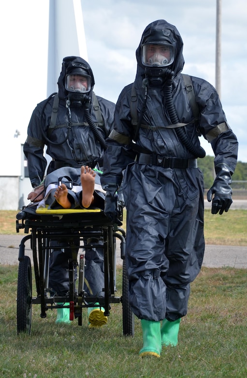 U.S. Army Reserve Soldiers with the 388th Chemical Biological Radiological Nuclear Company, out of Junction City, Wis., participated in a joint training exercise at the Stevens Point Municipal Airport Oct. 3, 2015. The 409th Area Support Medical Company out of Madison, Wis. and local Stevens Point and Portage County officials participated and observed. Local civilians volunteered to role play as casualties, including a family with two small children, bringing a new level of realism to this exercise and giving Soldiers real world experience in the delicate handling of children in mass casualty decontamination scenarios. The joint exercise gave everyone involved a chance to experience what their role would be in a real world emergency. Army Reserve Soldiers play a supporting role to the local officials, so it is vital to learn how to communicate and coordinate across organizations.