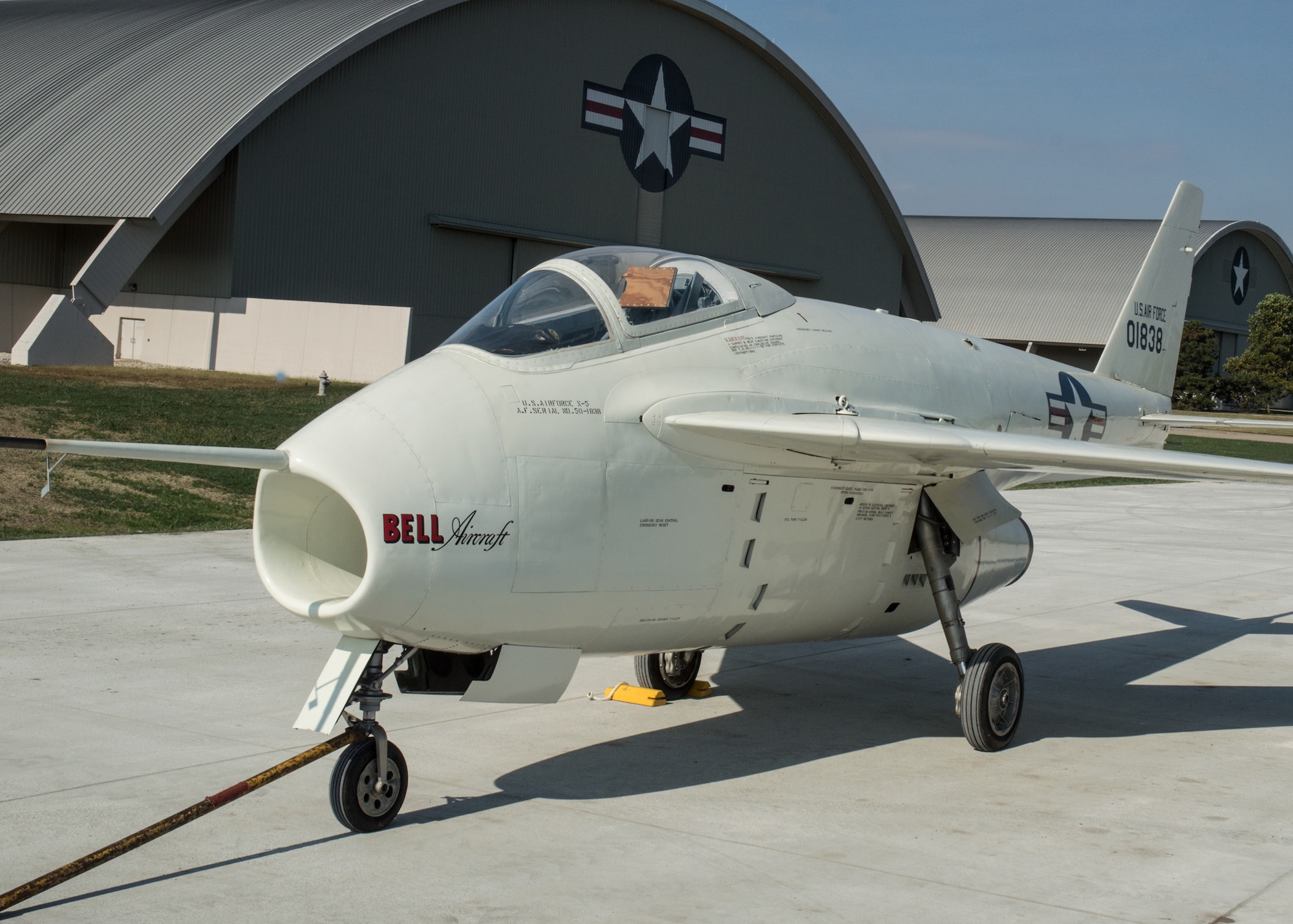 Restoration staff move the Bell X-5 into the new fourth building at the National Museum of the U.S. Air Force on Oct. 8, 2015. (U.S. Air Force photo by Ken LaRock)