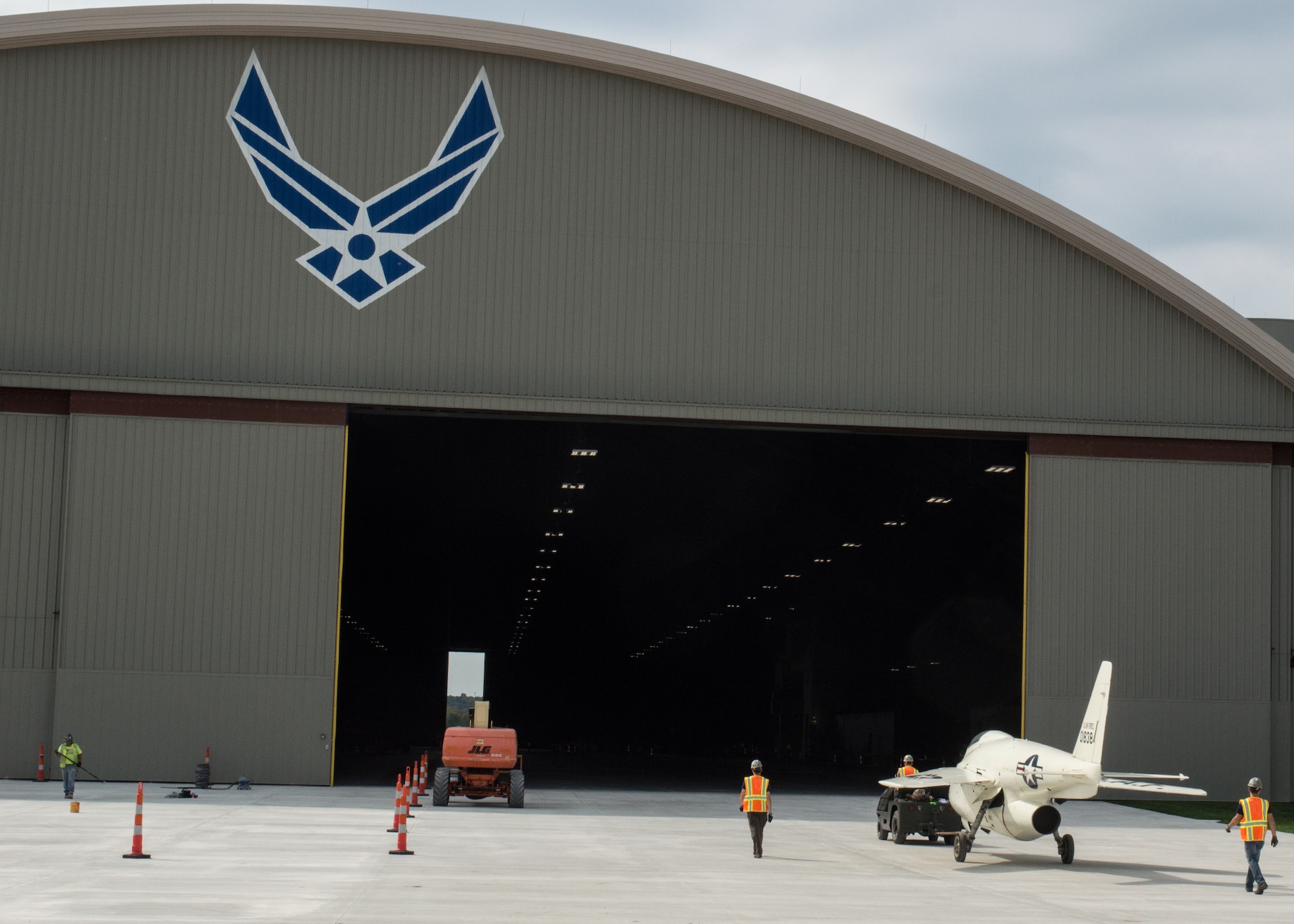 Restoration staff move the Bell X-5 into the new fourth building at the National Museum of the U.S. Air Force on Oct. 8, 2015. (U.S. Air Force photo by Ken LaRock)