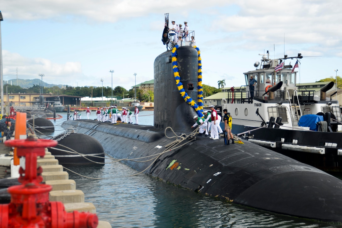 After completing a deployment, the Virginia-class attack submarine USS Hawaii returns to Joint Base Pearl Harbor-Hickam in Hawaii, March 10, 2015. The future USS Illinois is also a Virginia-class submarine. U.S. Navy photo by Petty Officer 1st Class Jason Swink                                                                                                                                                                                                                                                    