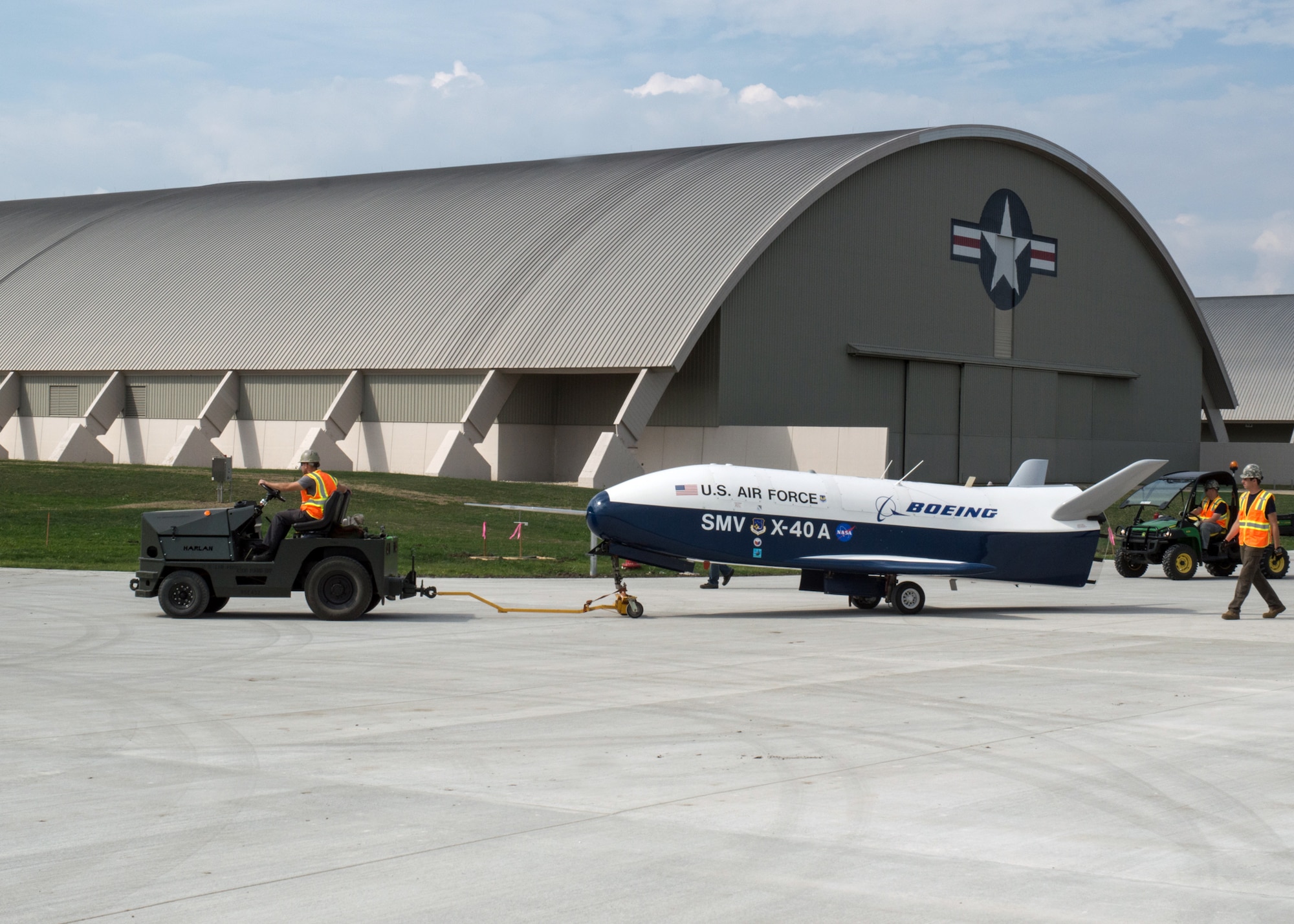 Restoration staff move the Boeing X-40A into the new fourth building at the National Museum of the U.S. Air Force on Oct. 8, 2015. (U.S. Air Force photo by Ken LaRock)