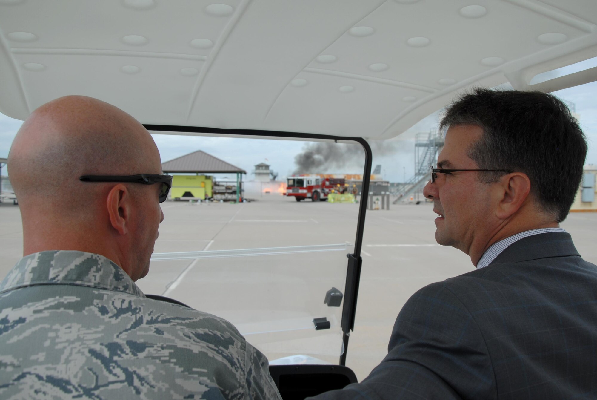 U.S. Air Force Lt. Col. Matthew D. Welling, 312th Training Squadron Commander, shows Sen. Charles L. Perry, 28th District of Texas Agriculture, Water and Rural Affairs Chairman, the fire training pad at the Louis F. Garland Department of Defense Fire Academy on Goodfellow Air Force Base, Texas, Oct. 8, 2015. Perry also learned about the 315th Training Squadron to understand the training at Goodfellow. (U.S. Air Force photo by Senior Airman Joshua Edwards/Released)