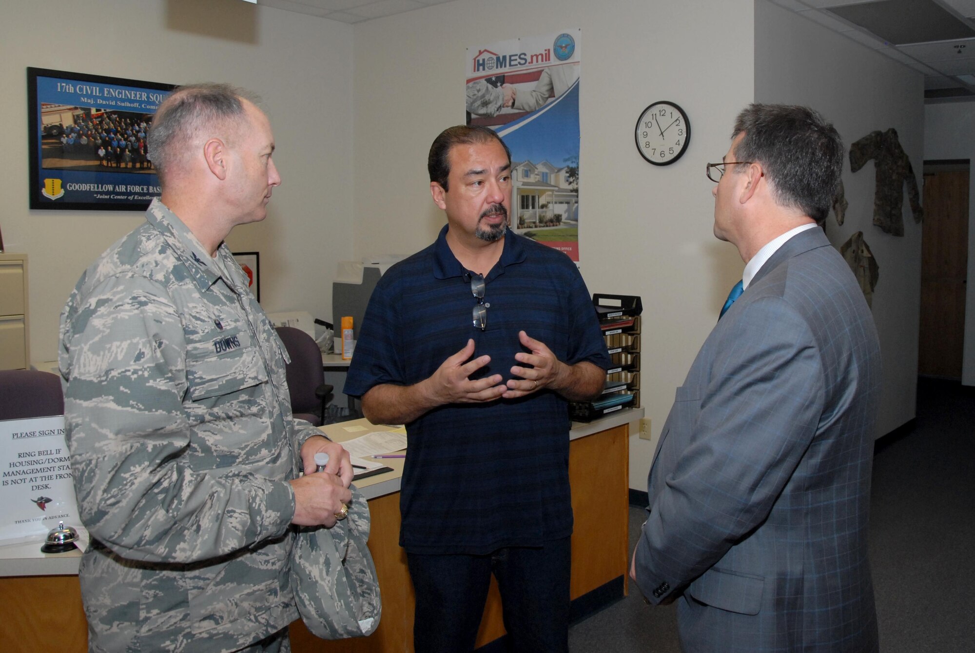 Victor L. Delarosa, 17th Civil Engineer Squadron dorm management chief, meets Sen. Charles L. Perry, 28th District of Texas Agriculture, Water and Rural Affairs Chairman, at the dorm management office on Goodfellow Air Force Base, Texas, Oct. 8, 2015. During Perry’s visit, he visited various places on base to learn more about the base’s mission and people. (U.S. Air Force photo by Senior Airman Joshua Edwards/Released)