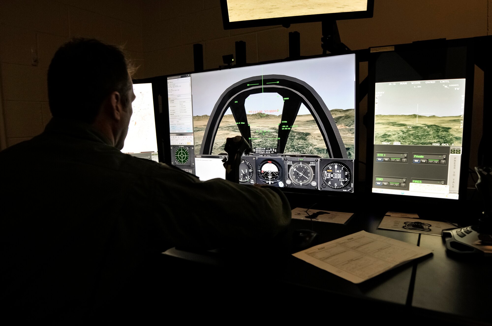 Lt. Col. Scott R. Twesme, air liaison officer with the 182nd Air Support Operations Group, Illinois Air National Guard, pilots a close air support aircraft during an Air National Guard Advanced Joint Terminal Attack Controller Training System training session at the 182nd Airlift Wing in Peoria, Ill., Oct. 5, 2015. Peoria’s TACPs teamed up with the QuantaDyn Corporation to help create the AAJTS, which is expected to potentially save the government $95 million through fiscal year 2018 by reducing the cost of qualification and continuation training by 48 percent. (U.S. Air National Guard photo/Staff Sgt. Lealan Buehrer)