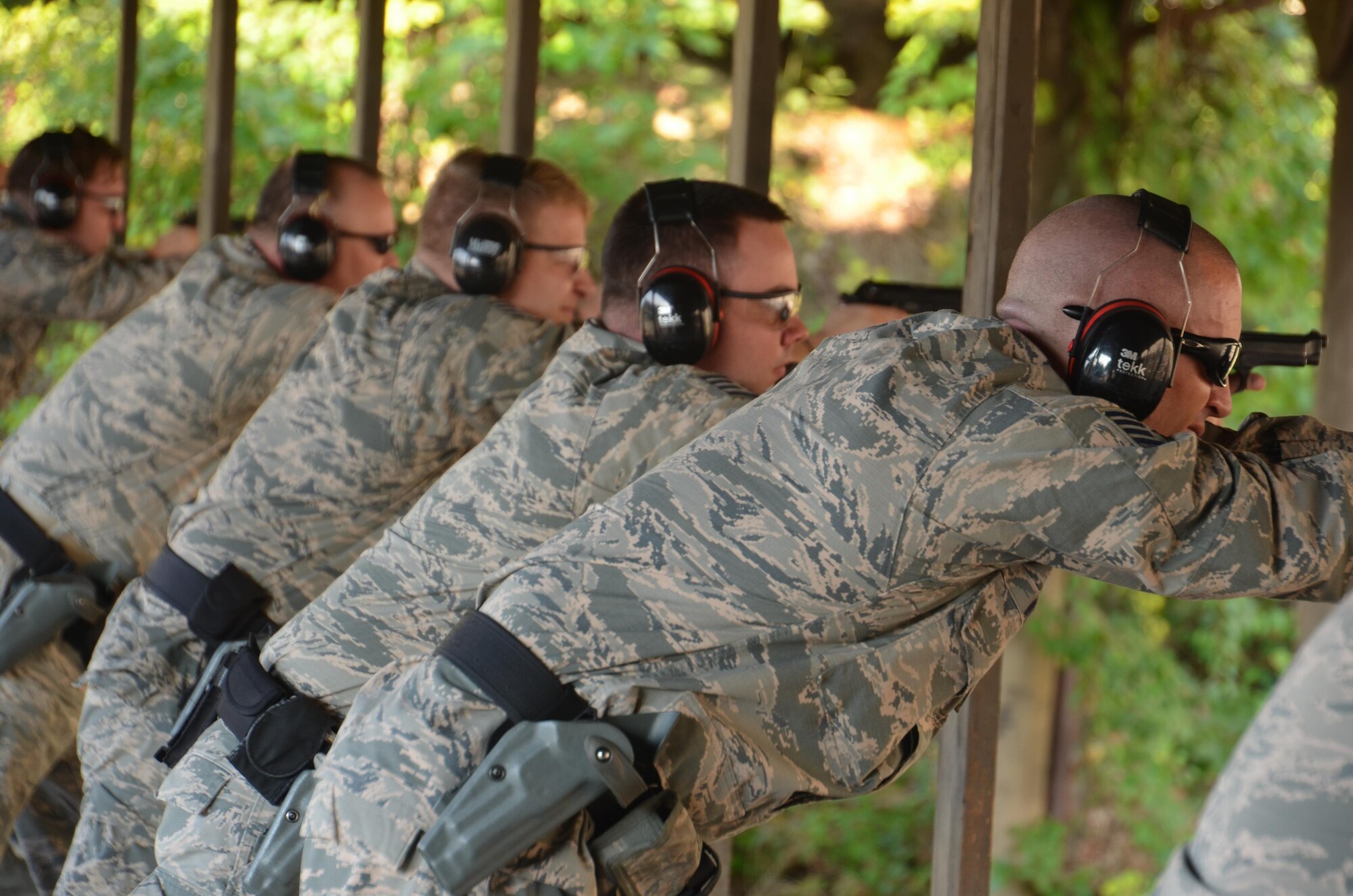 Members of the 439th Security Forces Squadron practice fire-arms training at the shooting range on base. The first portion of the training experience is held in a classroom, where those in attendance learn fundamentals.