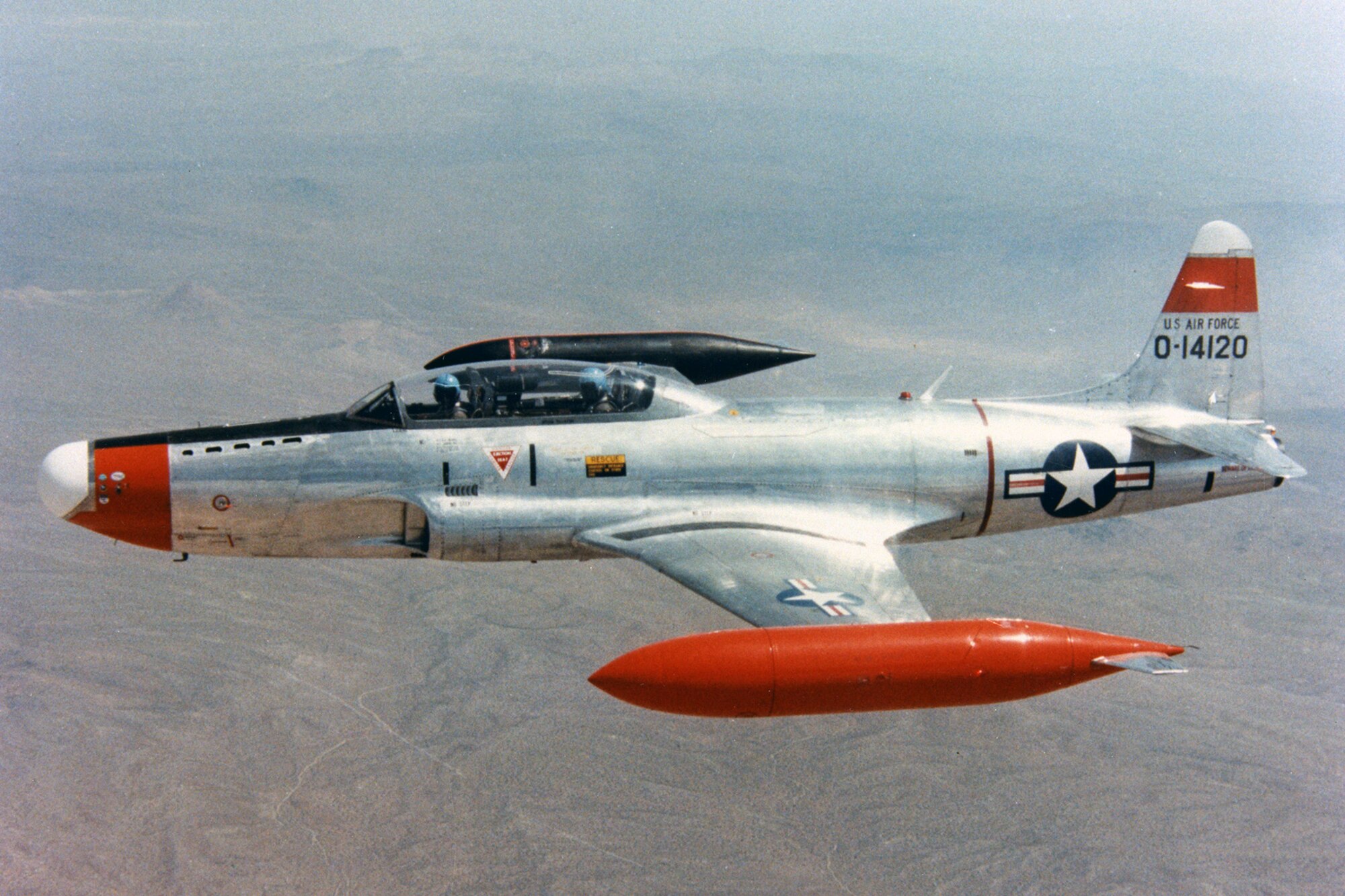When the evaluation pilot in the front seat moved the controls, the NT-33A responded as would the simulated aircraft. The rear seat was occupied by a safety pilot whose standard controls enabled him to fly the aircraft in case the computer malfunctioned or if the simulation proved too difficult to control. (U.S. Air Force photo)