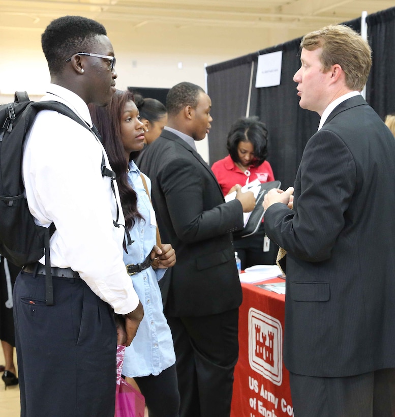 Wade Doss, chief of Huntsville Center's Civil Structures Division, talks with Maria Holloway and Byron Hudson about USACE career opportunities during the Alabama A&M University Fall Career Fair Oct. 1. Huntsville Center staff will next be at Oakwood University's Career Fair Oct. 20 in Huntsville.