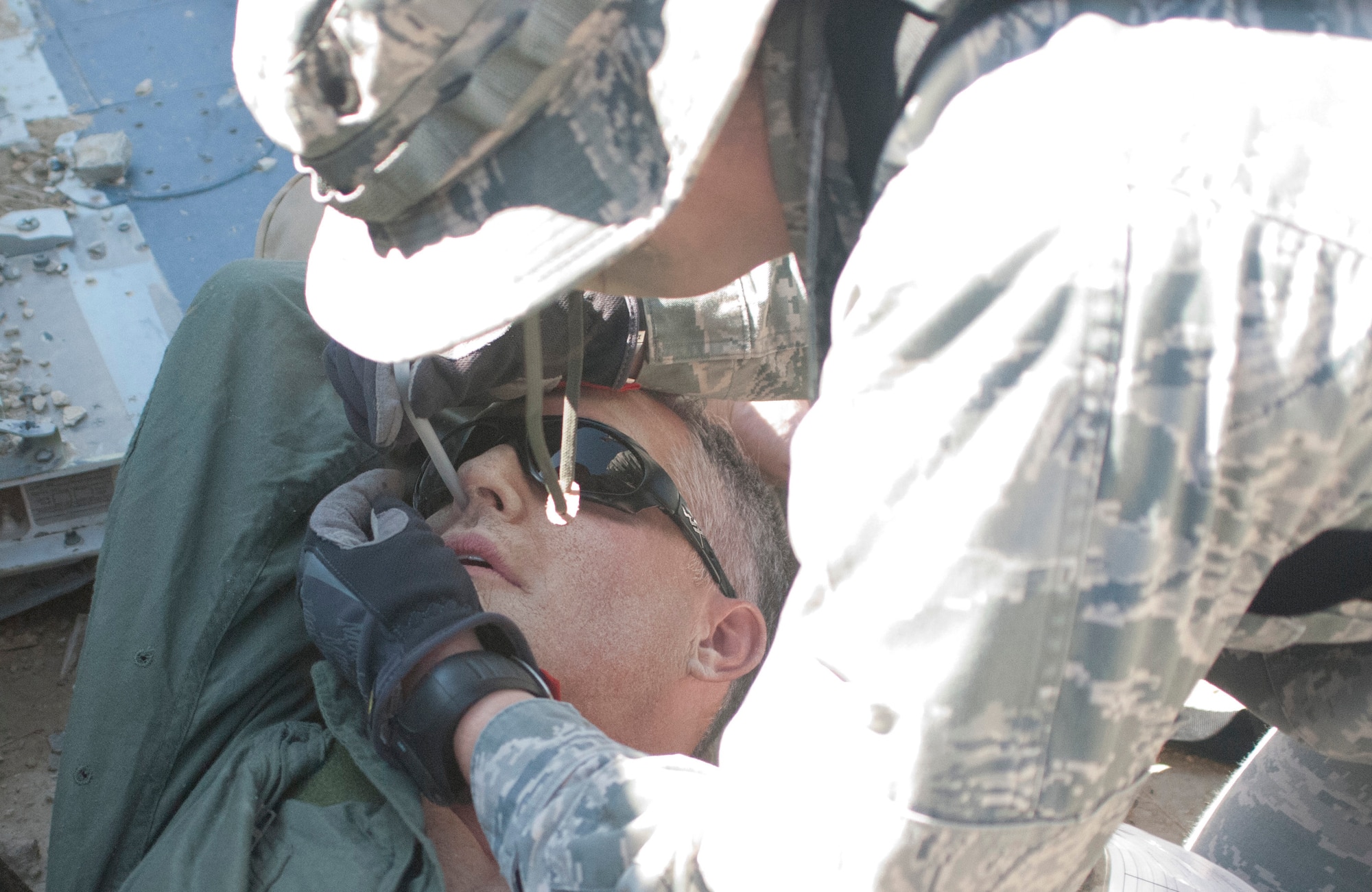 An Airman from the 460th Medical Group clears a patient’s airway during a training exercise Oct. 3, 2015, at Fort Carson, Colo. The 460th MDG completed annual combat leadership and combat medic training in order to prepare themselves for situations they could find themselves in while deployed in a hostile environment. (Courtesy photo) 