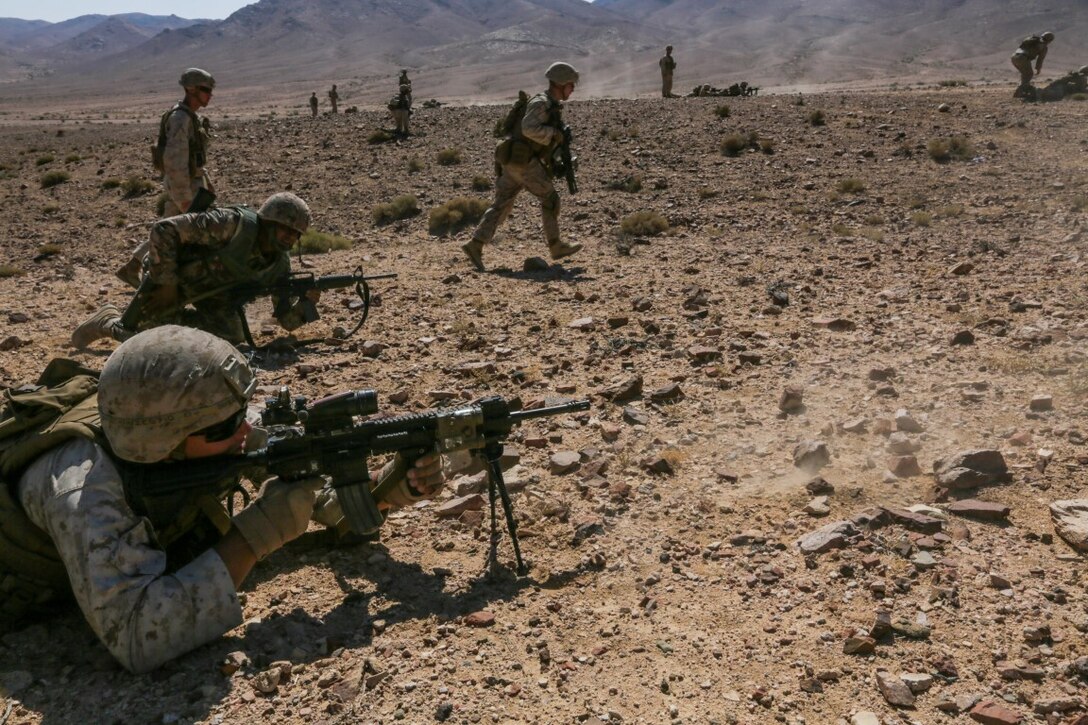 U.S. 5TH FLEET AREA OF OPERATIONS (Aug. 26, 2015) U.S. Marines with India Company, Battalion Landing Team 3rd Battalion, 1st Marine Regiment, 15th Marine Expeditionary Unit, perform firing drills alongside Jordanian Soldiers during a bilateral training evolution. The 15th MEU is deployed throughout the U.S. 5th Fleet area of operations to maintain regional security. (U.S. Marine Corps photo by Sgt. Jamean Berry/Released)