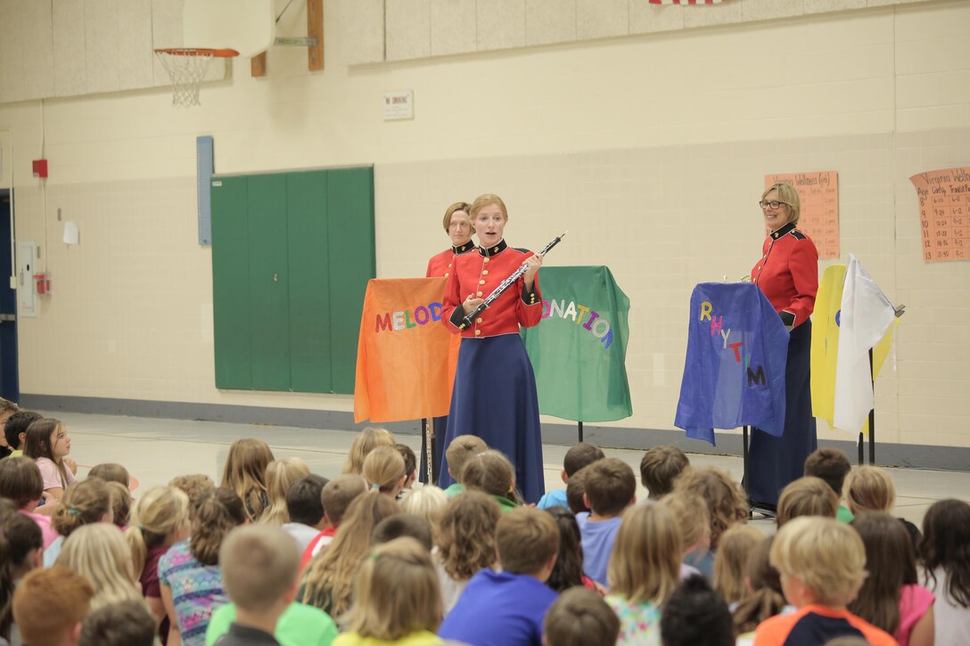 On Thursday, Oct. 8, a woodwind quintet from "The President's Own" U.S. Marine Band performed a Music in the Schools (MITS) program for fourth, fifth, and sixth graders at Waynewood Elementary School in Alexandria, Va. The band director, Jane Morgan, said at the conclusion of the presentation a sixth grader asked her if it was too late to sign up for band because he really liked what the quintet could do. A MITS success story! (U.S. Marine Corps photo by Master Sgt. Kristin duBois/released)