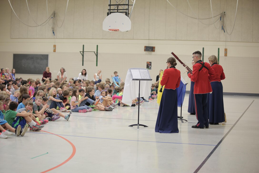 On Thursday, Oct. 8, a woodwind quintet from "The President's Own" U.S. Marine Band performed a Music in the Schools (MITS) program for fourth, fifth, and sixth graders at Waynewood Elementary School in Alexandria, Va. The band director, Jane Morgan, said at the conclusion of the presentation a sixth grader asked her if it was too late to sign up for band because he really liked what the quintet could do. A MITS success story! (U.S. Marine Corps photo by Master Sgt. Kristin duBois/released)