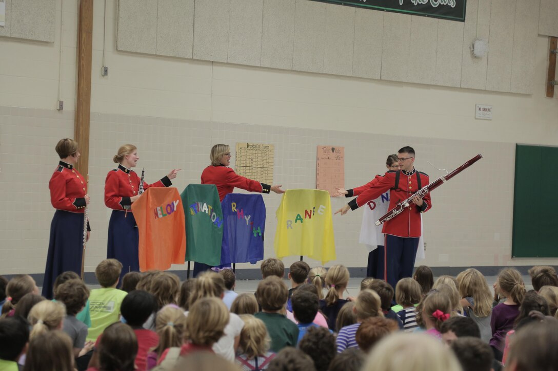 On Thursday, Oct. 8, a woodwind quintet from "The President's Own" U.S. Marine Band performed a Music in the Schools (MITS) program for fourth, fifth, and sixth graders at Waynewood Elementary School in Alexandria, Va. The band director, Jane Morgan, said at the conclusion of the presentation a sixth grader asked her if it was too late to sign up for band because he really liked what the quintet could do. A MITS success story! (U.S. Marine Corps photo by Master Sgt. Kristin duBois/released)