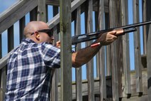 1st Lt. Austin Mass fires a rifle at a moving target during a skeet range at Marine Corps Air Station Cherry Point, N.C., Oct. 7, 2015. Marines with 2nd Low Altitude Air Defense Battalion held a weapons safety class and participated in the range as part of their Firearms Mentorship Program to promote proper weapons safety and education in a recreational manor. The program allows Marines to maintain their basic rifleman skills and receive further education on safety measures while handling weapons. Mass is a logistics officer with the battalion. (U.S. Marine Corps photo by Cpl. N.W. Huertas/Released)   
