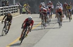 U.S. Air National Guard Capt. Sean Cahill leads the pack of 86 cyclists from 16 nations early in the 131-kilometer bike race on the outskirts of Mungyeong, South Korea, during the CISM World Games, Oct. 7, 2015