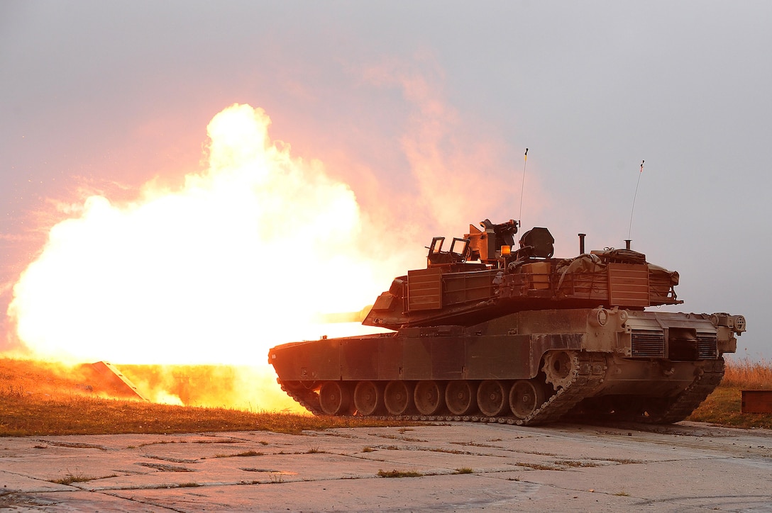 U.S. soldiers in an M1A2 Abrams tank conduct gunnery operations during exercise Combined Resolve V at the 7th Army Joint Multinational Training Command in Grafenwoehr, Germany, Oct. 8, 2015. The soldiers are assigned to the 3rd Infantry Division’s 1st Battalion, 64th Armor Regiment, 1st Armored Brigade Combat Team. U.S. Army photo by Gertrud Zach