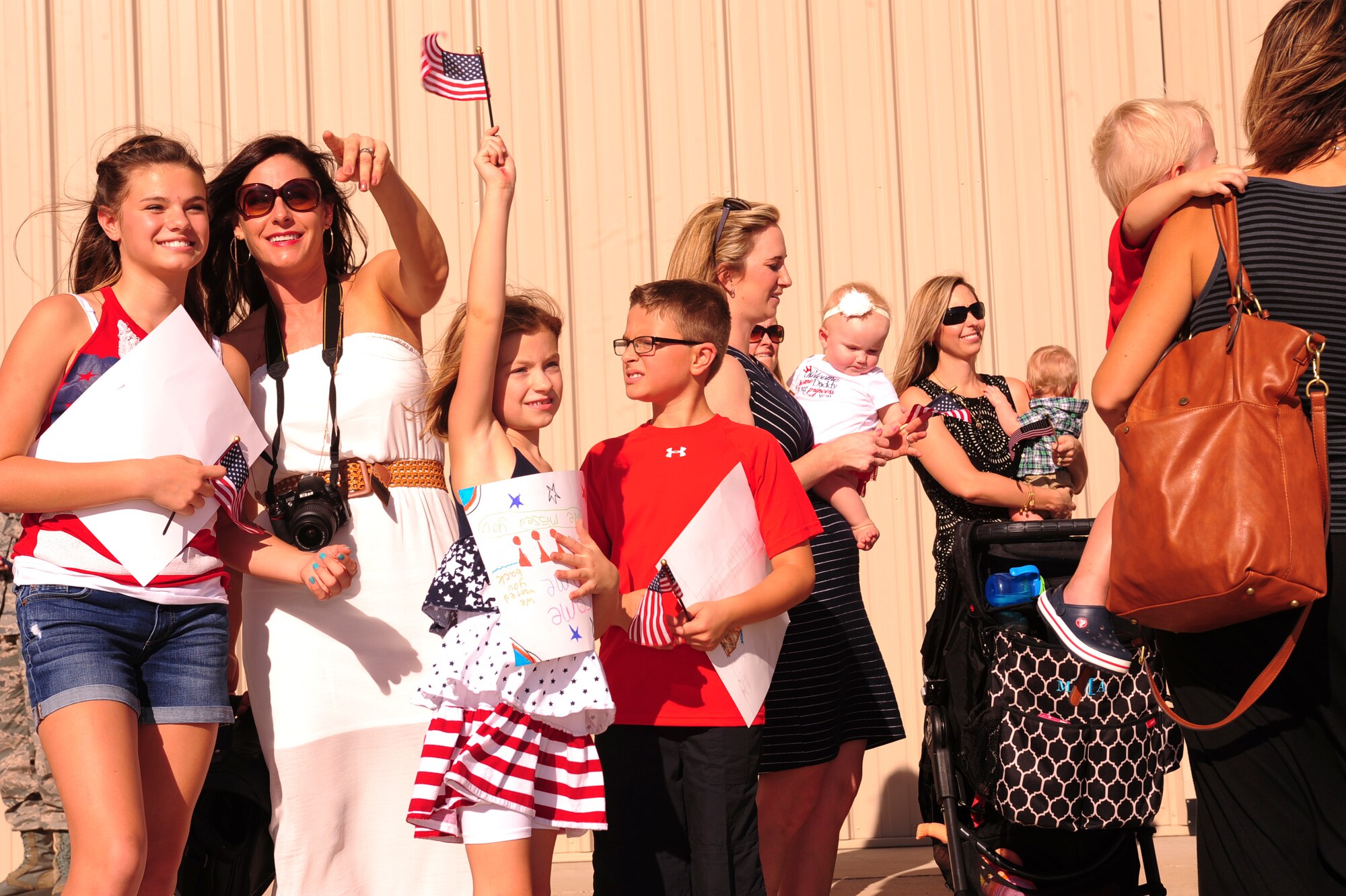 Friends and family greet U.S. Airmen from the 563rd Rescue Group upon their homecoming from a deployment at Davis-Monthan Air Force Base, Ariz., Oct. 9, 2015. Approximately 25 Airmen returned home from a 4-month deployment to Southwest Asia. (U.S. Air Force photo by Airman Basic Nathan H. Barbour/Released)