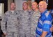 Lt. Col. Casey Ward, 6th Special Operations Squadron commander, dons his new look after members of the unit shaved his head as part of a teambuilding event at Duke Field, Fla., Oct. 8, 2015. Ward leads the elite squadron whose mission is to assess, train, advise and assist foreign aviation forces in airpower employment, sustainment and force integration.(U.S. Air Force photo/Lt. Col. James R. Wilson)