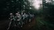 The remaining Expert Field Medic Badge candidates from platoon two march through the woods during the EFMB test at Joint Base Lewis-McChord, Wash., Sept. 26, 2015. In June 1965, the U.S. Army expanded its awards program by implementing the EFMB for combat medics who do not see battle. (U.S. Air Force photo by Senior Airman Jordan Castelan/Released)