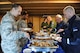 U.S. Air Force Airmen and Estonian air force Airmen go through the buffet line during an icebreaker event at Amari Air Base, Estonia, Oct. 1, 2015. The 74th Expeditionary Fighter Squadron Airmen, assigned to the 23d Wing at Moody Air Force Base, Georgia, are deployed as part of a Theater Security Package in support of Operation Atlantic Resolve. (U.S. Air Force photo by Andrea Jenkins/Released)