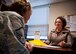 Katina Dimitro, 434th Force Support Squadron Airman and Family Readiness Center personal financial counselor, discusses identity protection measures during a meeting with an Airman at Grissom Air Reserve Base, Ind., Oct. 9, 2015. Dimitro provides one-on-one meetings and group briefings to educate Airmen on steps they can take to safeguard personally identifiable information to help prevent identity theft. (U.S. Air Force photo/Senior Airman Katrina Heikkinen)