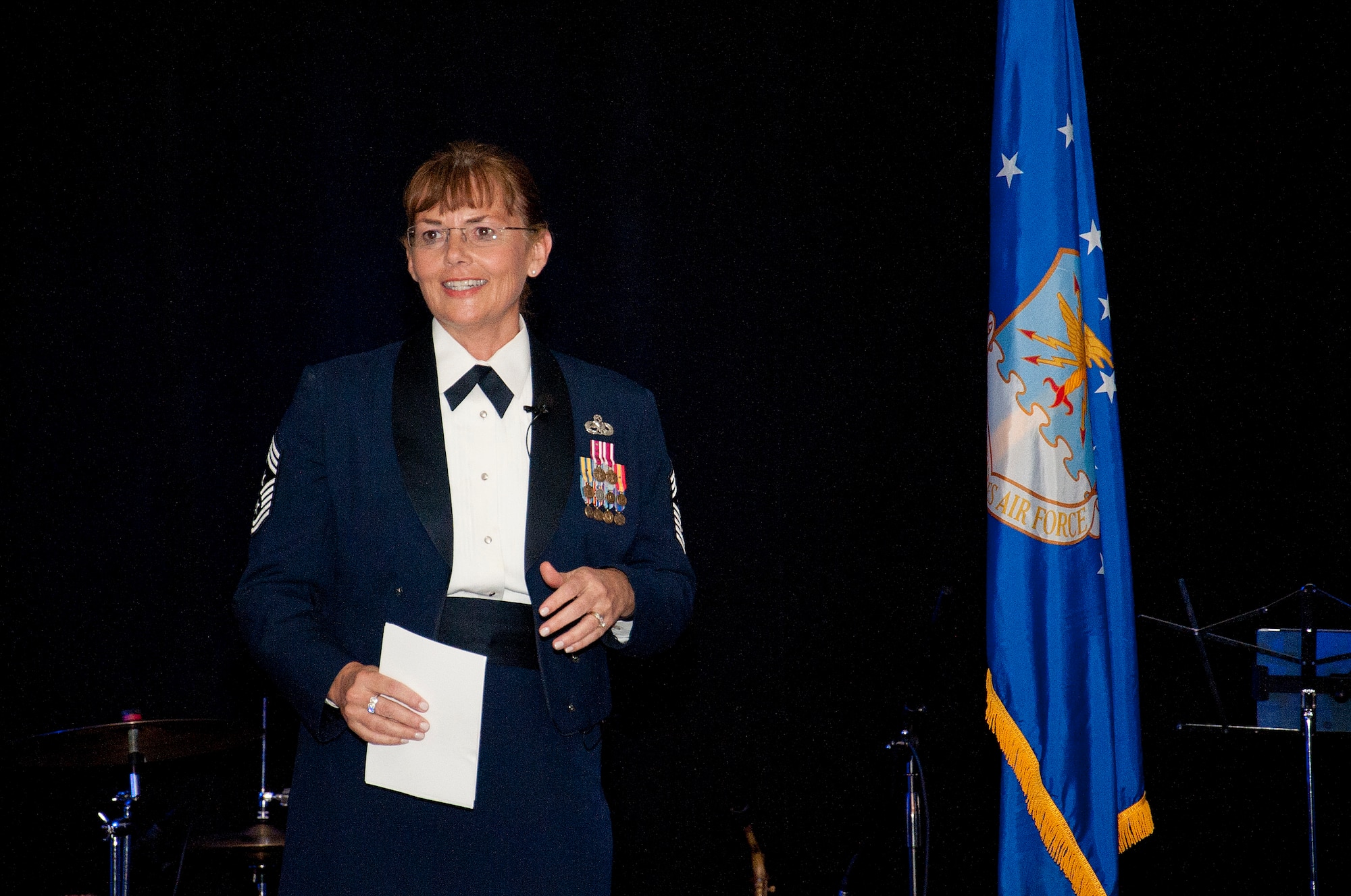 Chief Master Sgt. Victoria Gamble, Air Mobility Command command chief, delivers a message on confidence Oct. 2, 2015, during the 68th Annual Air Force Ball at the Hilton Tampa Downtown in Tampa, Fla. Gamble expressed how grateful she is to have the opportunity to serve alongside these confidently amazing Airmen in her career and encourages Airmen to remember yesterday, focus on today and look forward to tomorrow while continuing to serve. (U.S. Air Force photo by Senior Airman Jenay Randolph/Released)