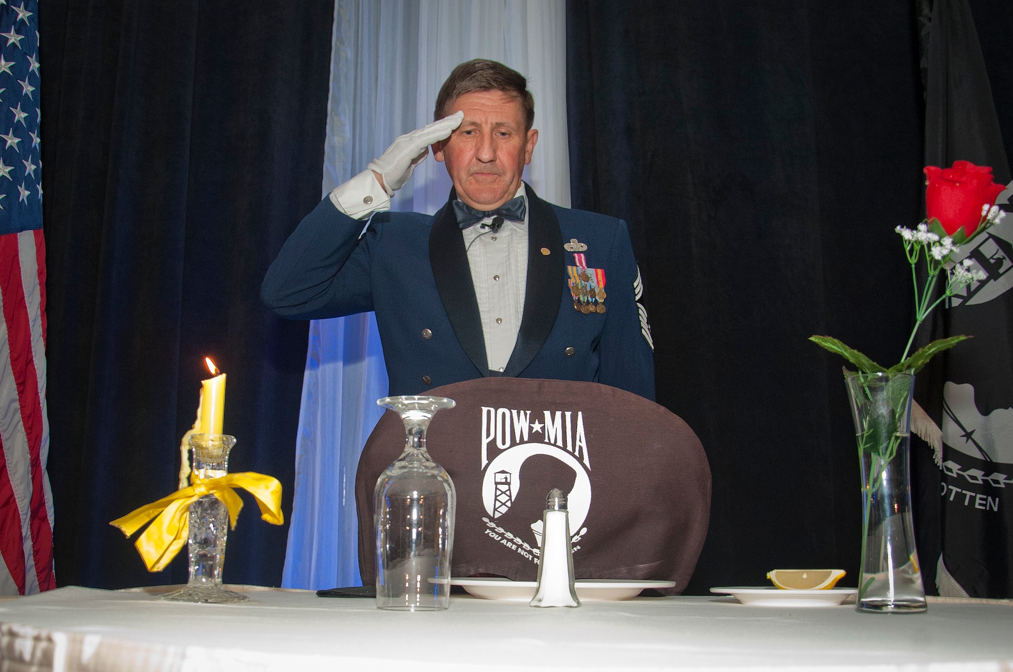 Retired Chief Master Sgt. David Hamel performs for the POW/MIA remebrance Oct. 2, 2015, during the 68th Annual Air Force Ball at the Hilton Tampa Downtown in Tampa, Fla. The ball was full of great memories, which included performances from the Heralds of Harmony, POW/MIA remembrance, dinner and dancing the night away to the music of the Phase 5 Band. (U.S. Air Force photo by Senior Airman Jenay Randolph/Released)