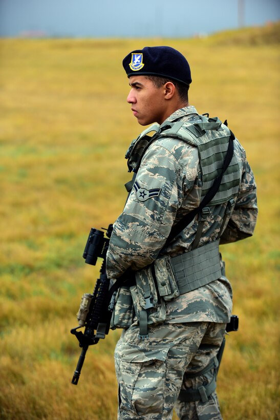Airman 1st Class Eli Morgan, 28th Security Forces Squadron response force member, waits for instruction during a Shoot, Move, Communicate training at Ellsworth Air Force Base, S.D., Sept. 29, 2015. The 28th SFS conducts various types of training year-round to ensure all members are proficient and deployable. (U.S. Air Force photo by Airman 1st Class James L. Miller/Released)