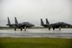 Two F-15E Strike Eagles await the green light from air traffic control to take off in support of Operation Noble Eagle, Sept. 25, 2015, at Seymour Johnson Air Force Base, North Carolina. The three-day operation helped thwart any possible threats during the Pope’s visit to Washington, D.C. and New York. (U.S. Air Force photo/Senior Airman Brittain Crolley)