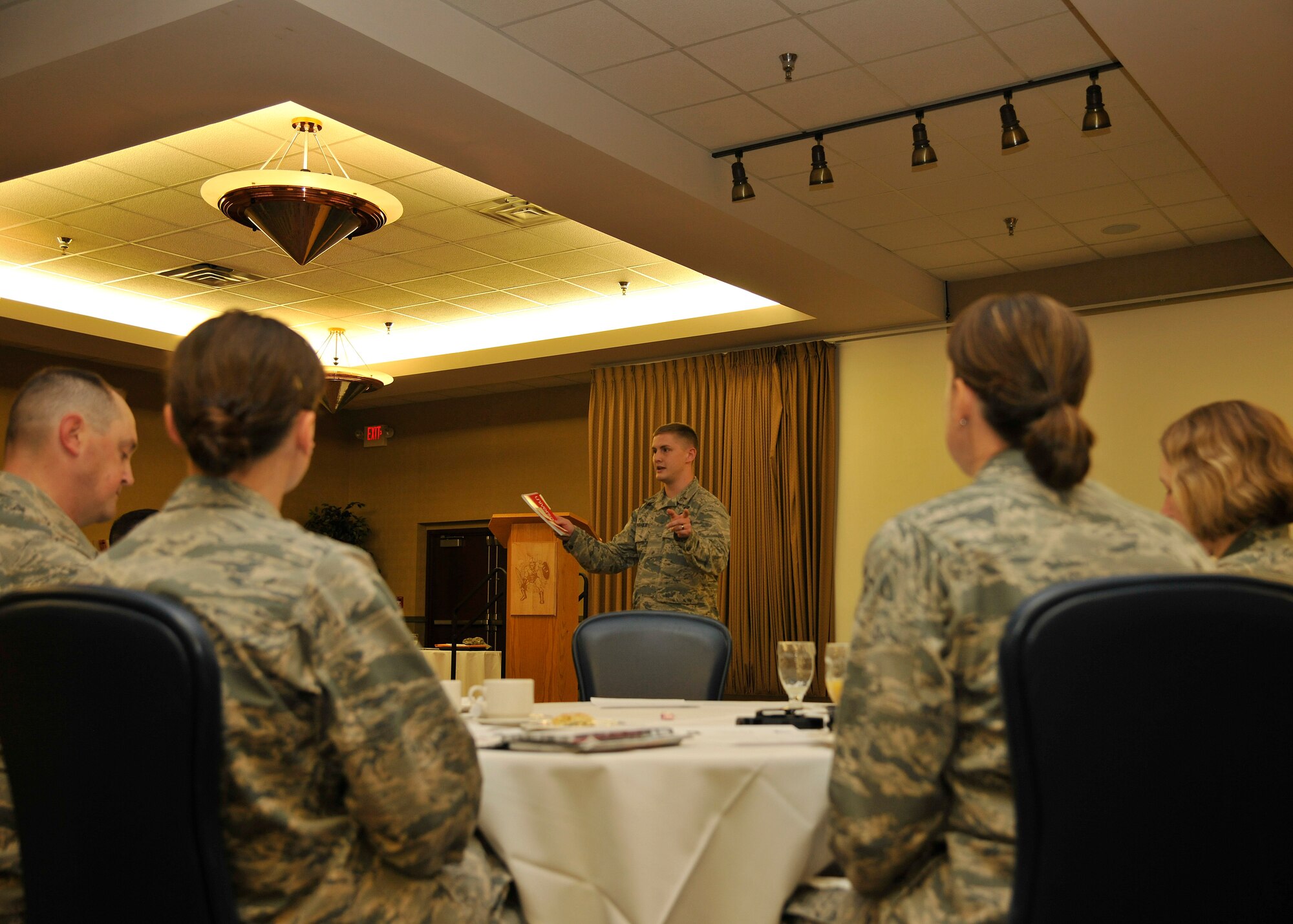 2nd Lt. James Fisher, 319th Air Base Wing public affairs officer, informs the Warriors of the North about the upcoming 2015 Combined Federal Campaign at a kickoff breakfast Oct. 7, 2015, on Grand Forks Air Force Base, North Dakota. More than 40 attendees showed up to this year’s CFC breakfast kickoff. This year’s slogan is “You can Change a Life,” which donors can pledge to more than 24,000 charities. (U.S. Air Force photo by Senior Airman Xavier Navarro/Released)