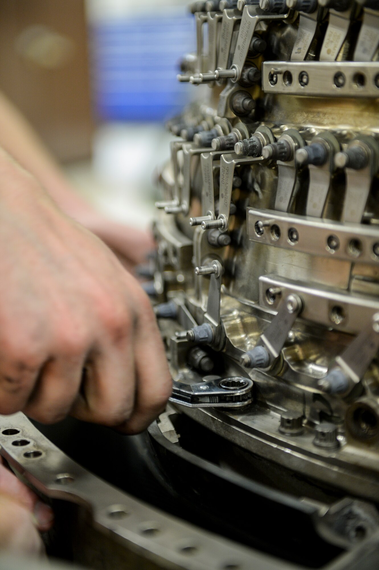 U.S. Air Force Senior Airman Cody Bowman, a 354th Maintenance Squadron aerospace propulsion journeyman, services a jet engine compressor Oct. 8, 2015, during an engine rebuild in the engine shop at Eielson Air Force Base, Alaska. Bowman disassembled the compressor for a fan blade inspection. (U.S. Air Force photo by Senior Airman Peter Reft/Released) 