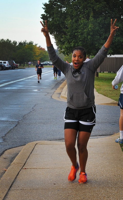 Senior Amn. Erlesha L. Wicks participates in the 5K Fun Run "Stampede" at Joint Base Andrews on 9 October 2015. Wicks is a member of the 811th Security Forces Squadron at Joint Base Andrews. The 5K kicked off the 2015 Combined Federal Campaign. The run raised awareness for the giving campaign through which Airmen can donate to their favorite charities until 15 December 2015.  (U.S. Air Force photo/James E. Lotz)