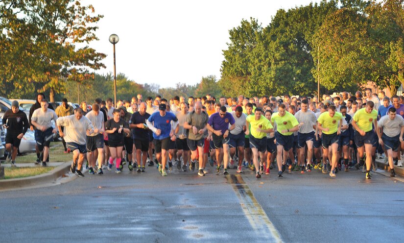 Airmen participate in the 5K Fun Run "Stampede" at Joint Base Andrews on 9 October 2015. The 5K kicked off the 2015 Combined Federal Campaign. The run raised awareness for the giving campaign through which Airmen can donate to their favorite charities until 15 December 2015.  (U.S. Air Force photo/James E. Lotz)